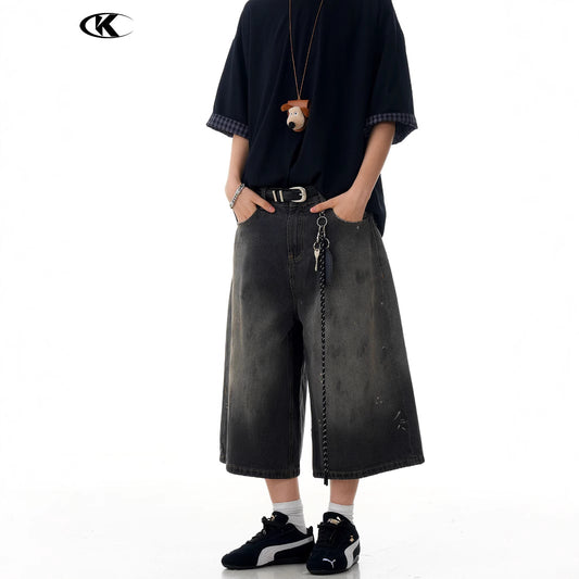 Seven-Quarter Denim Shorts with Faded Ink Splatter - Trendy Wide-Leg Fit