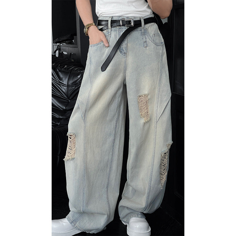 Washed Ripped Denim Curved Knife Hanging Loose Wide Leg Pants
